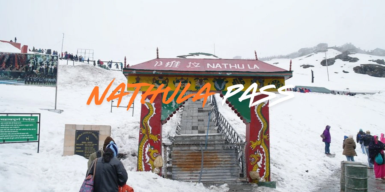 Nathula Pass in Sikkim covered in snow with Indo-China border gate and tourists in winter